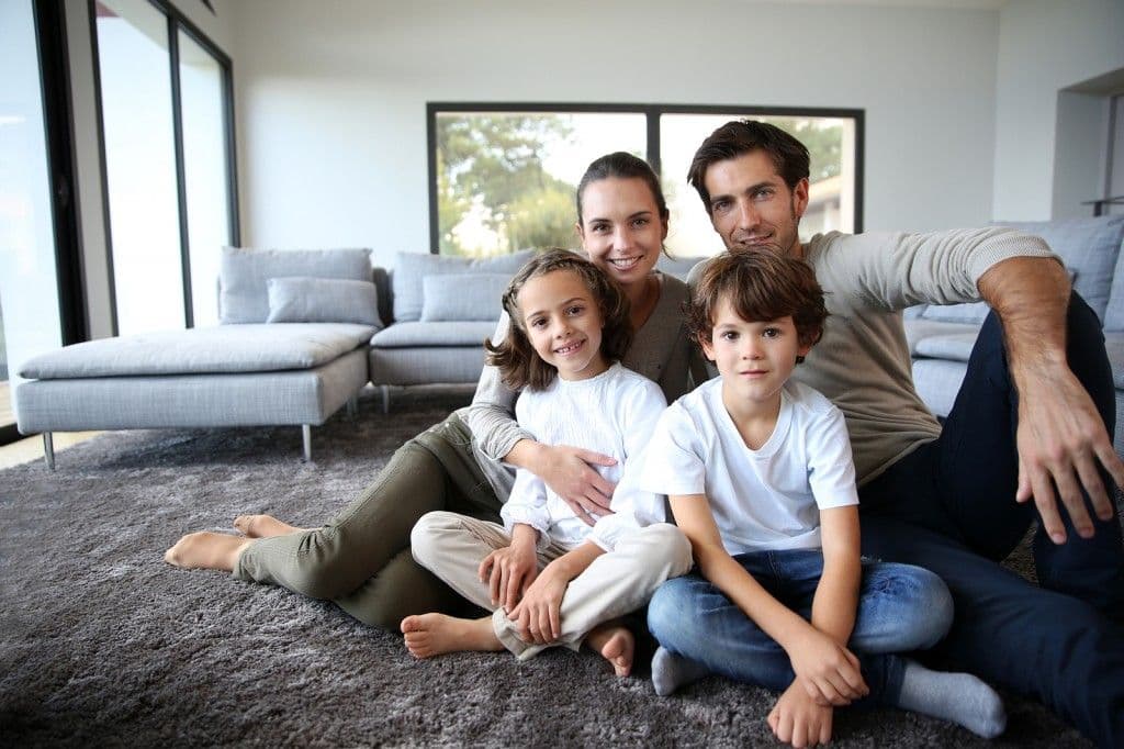 bigstock-Happy-family-portrait-at-home